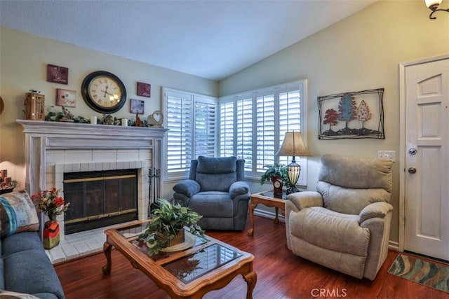 9793 Louise Way, Rancho Cucamonga, CA 91730 - living area featuring vaulted ceiling, a brick fireplace, and wood finished floors