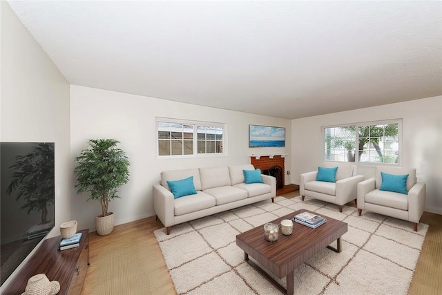 21323 Martin St, Carson, CA 90745 - living room featuring baseboards and wood finished floors
