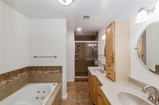 21323 Martin St, Carson, CA 90745 - full bathroom with a shower stall, a whirlpool tub, double vanity, and tile patterned floors