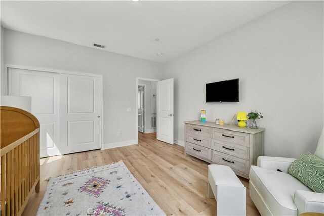 27010 Declaration Rd, Valencia, CA 91381 - bedroom with light wood-type flooring, baseboards, and a closet