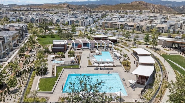 27010 Declaration Rd, Valencia, CA 91381 - aerial view of residential area with a pool area and a mountain backdrop