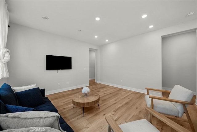 27010 Declaration Rd, Valencia, CA 91381 - living room featuring light wood-type flooring, recessed lighting, and baseboards