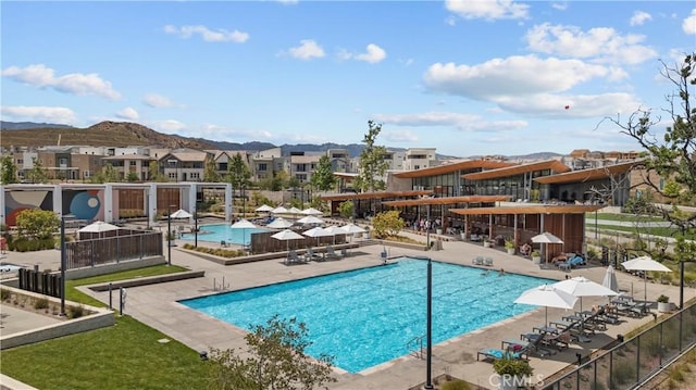 27010 Declaration Rd, Valencia, CA 91381 - community pool with a patio area, a mountain view, and a residential view
