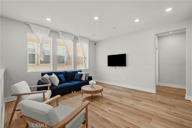 27010 Declaration Rd, Valencia, CA 91381 - living room featuring baseboards, light wood-style flooring, and recessed lighting