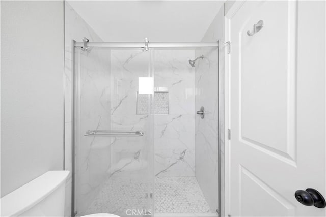 12151 Reagan St, Los Alamitos, CA 90720 - full bath featuring a marble finish shower and toilet