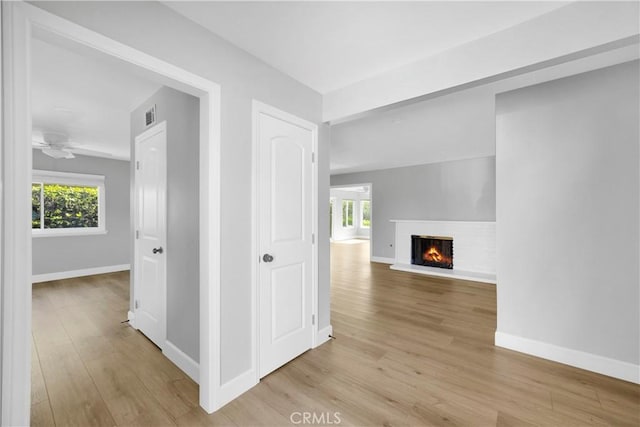 12151 Reagan St, Los Alamitos, CA 90720 - hall with light wood finished floors and baseboards