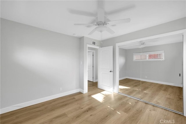 12151 Reagan St, Los Alamitos, CA 90720 - unfurnished bedroom featuring baseboards, wood finished floors, a closet, and ceiling fan