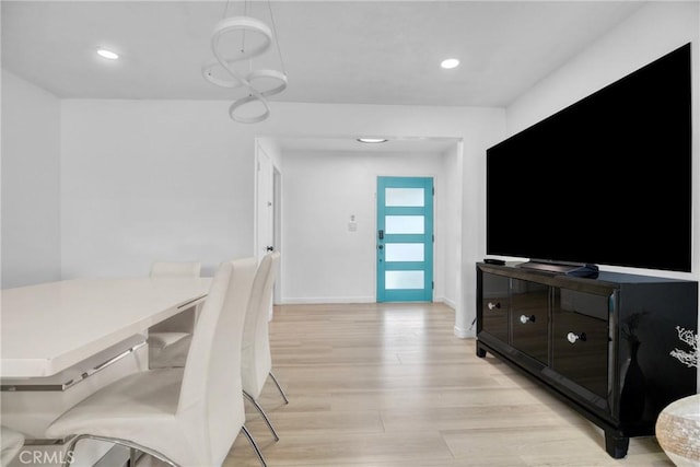 1158 N Ivescrest Ave, Covina, CA 91724 - dining area with light wood-type flooring and recessed lighting