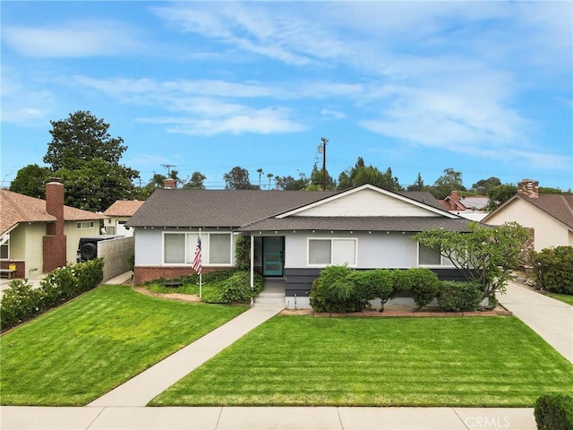 1158 N Ivescrest Ave, Covina, CA 91724 - ranch-style home with a front lawn, roof with shingles, brick siding, and concrete driveway