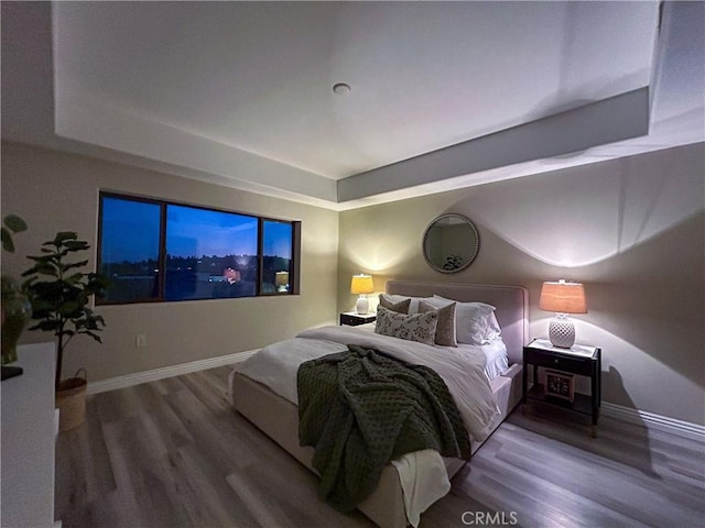 600 N Atlantic Blvd Unit 625, Monterey Park, CA 91754 - bedroom with a raised ceiling, wood finished floors, and baseboards