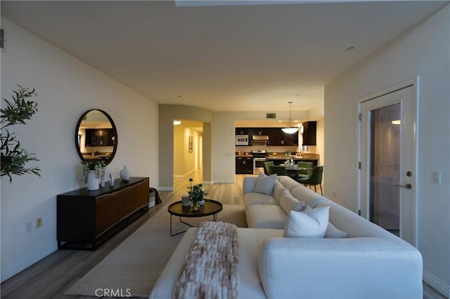 600 N Atlantic Blvd Unit 625, Monterey Park, CA 91754 - living room featuring wood finished floors and baseboards