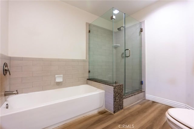 600 N Atlantic Blvd Unit 625, Monterey Park, CA 91754 - bathroom featuring a shower stall, a garden tub, wood finished floors, and toilet