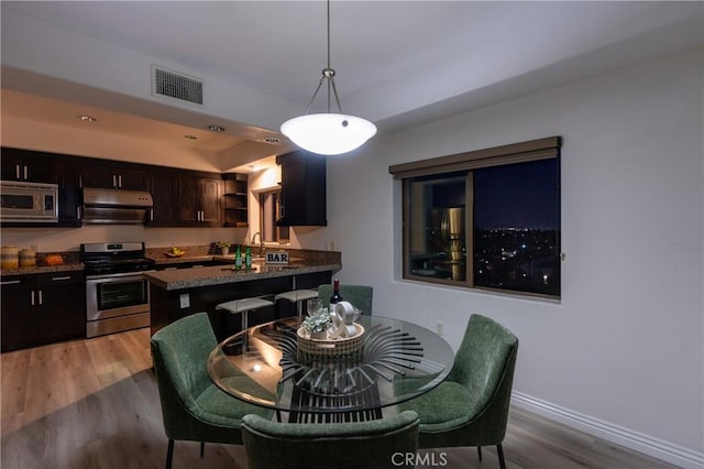 600 N Atlantic Blvd Unit 625, Monterey Park, CA 91754 - dining room with light wood-style floors and baseboards