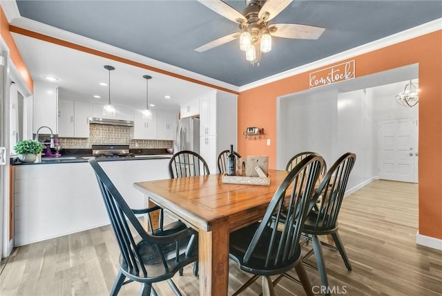 737 Cobb Ave, Placentia, CA 92870 - dining room featuring light wood-style flooring, a ceiling fan, crown molding, baseboards, and recessed lighting