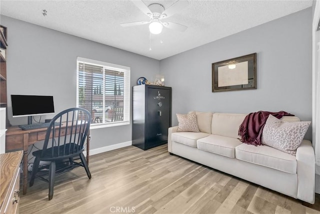 737 Cobb Ave, Placentia, CA 92870 - office space with light wood-style flooring, baseboards, ceiling fan, and a textured ceiling