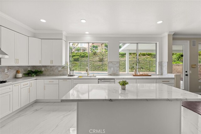 16209 Eagleridge Ct, La Mirada, CA 90638 - kitchen with a sink, healthy amount of natural light, light stone counters, recessed lighting, and crown molding
