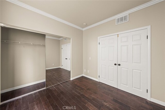 16209 Eagleridge Ct, La Mirada, CA 90638 - unfurnished bedroom featuring a closet, ornamental molding, hardwood / wood-style floors, and baseboards
