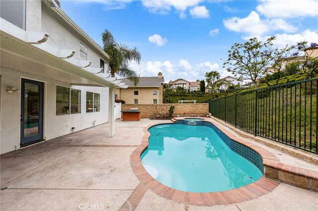 16209 Eagleridge Ct, La Mirada, CA 90638 - view of swimming pool featuring a fenced backyard, a patio, and a pool with connected hot tub