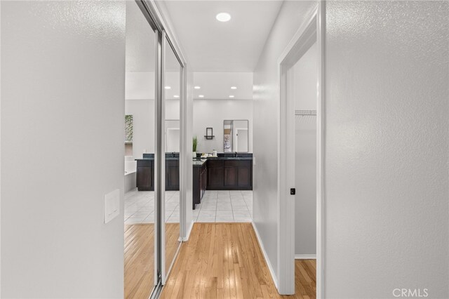 16209 Eagleridge Ct, La Mirada, CA 90638 - hall with light wood-style flooring, recessed lighting, and baseboards