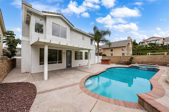 16209 Eagleridge Ct, La Mirada, CA 90638 - view of pool featuring a fenced backyard, a patio, and a pool with connected hot tub