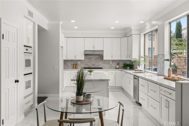 16209 Eagleridge Ct, La Mirada, CA 90638 - kitchen featuring light marble finish flooring, double oven, decorative backsplash, recessed lighting, and under cabinet range hood