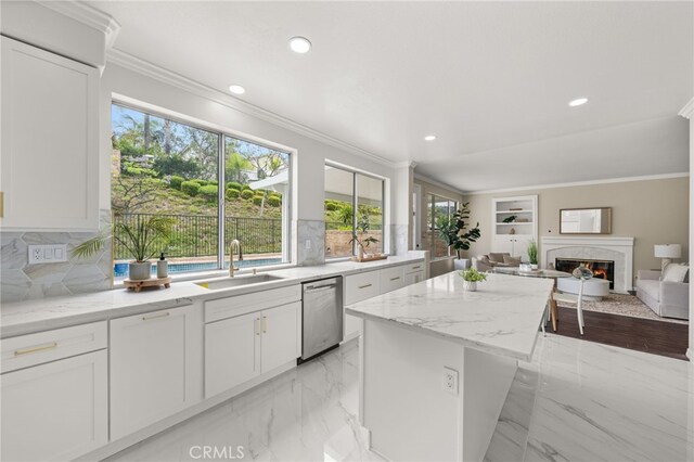 16209 Eagleridge Ct, La Mirada, CA 90638 - kitchen featuring a sink, dishwasher, a center island, healthy amount of natural light, and crown molding