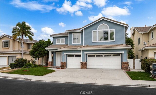 16209 Eagleridge Ct, La Mirada, CA 90638 - view of front of home featuring a garage, driveway, and a tiled roof