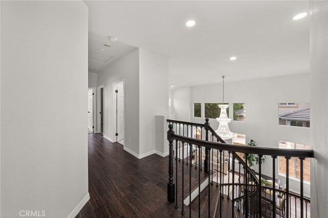 16209 Eagleridge Ct, La Mirada, CA 90638 - hall featuring an upstairs landing, baseboards, wood finished floors, healthy amount of natural light, and recessed lighting