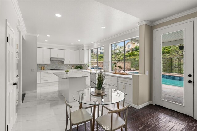 16209 Eagleridge Ct, La Mirada, CA 90638 - dining space featuring healthy amount of natural light, ornamental molding, baseboards, and recessed lighting
