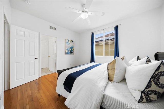 26 Middleton, Irvine, CA 92620 - bedroom featuring hardwood / wood-style floors and a ceiling fan