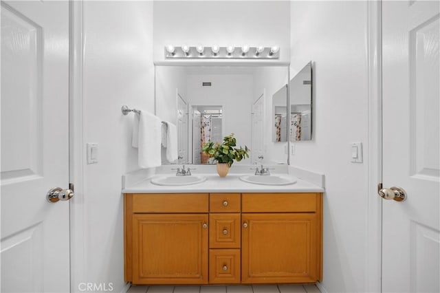 26 Middleton, Irvine, CA 92620 - bathroom featuring double vanity and a shower