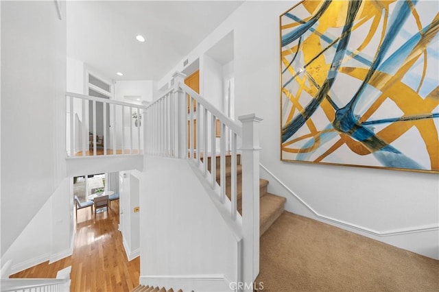 26 Middleton, Irvine, CA 92620 - stairs featuring wood finished floors, recessed lighting, and baseboards
