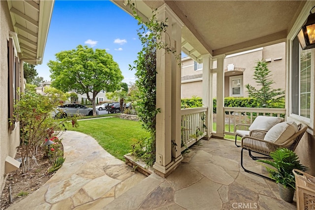26 Middleton, Irvine, CA 92620 - covered porch featuring a yard