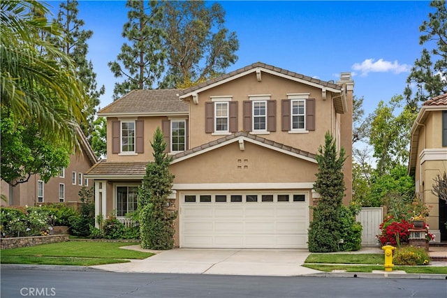 26 Middleton, Irvine, CA 92620 - traditional-style home with an attached garage, concrete driveway, stucco siding, and a tile roof