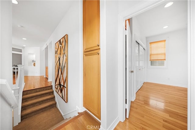 26 Middleton, Irvine, CA 92620 - hall featuring light wood-type flooring, recessed lighting, baseboards, and stairway