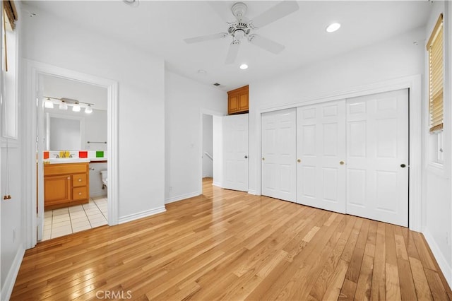 26 Middleton, Irvine, CA 92620 - unfurnished bedroom featuring light wood-style floors, a closet, baseboards, recessed lighting, and connected bathroom