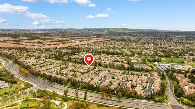 26 Middleton, Irvine, CA 92620 - aerial view of property's location featuring nearby suburban area and a mountain backdrop
