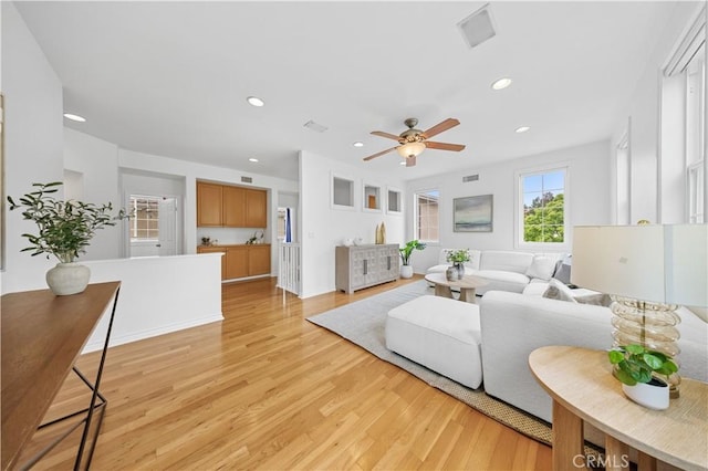 26 Middleton, Irvine, CA 92620 - living area featuring light wood-style floors, a ceiling fan, and recessed lighting