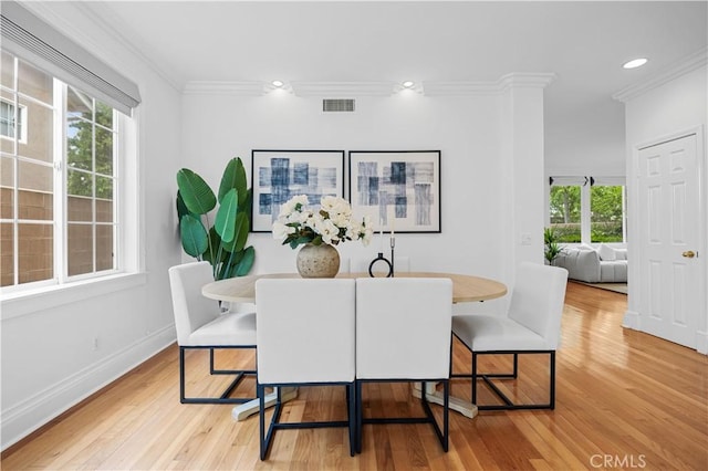 26 Middleton, Irvine, CA 92620 - dining room featuring ornamental molding, healthy amount of natural light, light wood-type flooring, baseboards, and recessed lighting