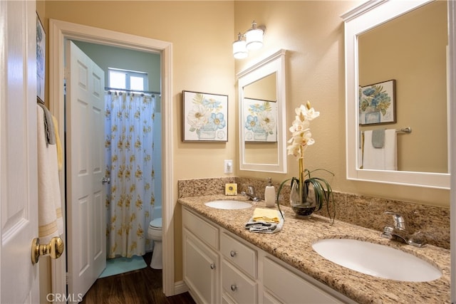 42926 Joshua Tree Ct, Murrieta, CA 92562 - bathroom with toilet, double vanity, wood finished floors, and a shower with shower curtain