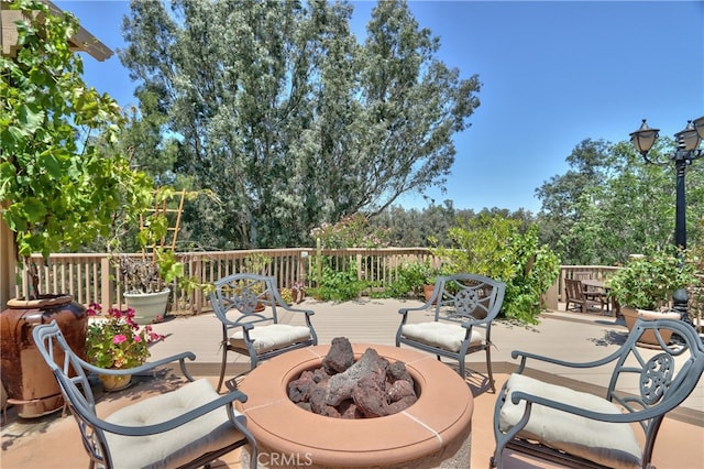 42926 Joshua Tree Ct, Murrieta, CA 92562 - wooden terrace with a fire pit