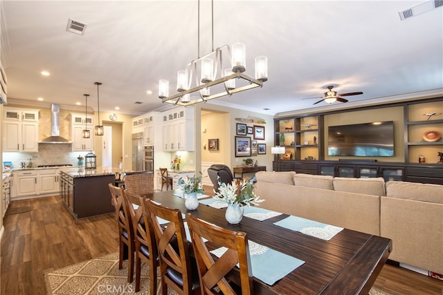 42926 Joshua Tree Ct, Murrieta, CA 92562 - dining space with a ceiling fan, crown molding, dark wood-style floors, and recessed lighting