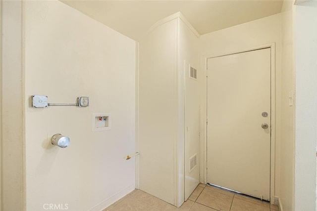 45409 Rodin Ave, Lancaster, CA 93535 - laundry area with washer hookup and light tile patterned floors