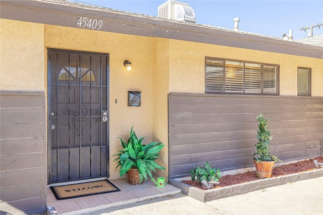 45409 Rodin Ave, Lancaster, CA 93535 - doorway to property with stucco siding