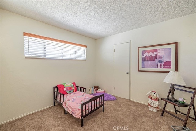 45409 Rodin Ave, Lancaster, CA 93535 - bedroom with carpet floors and a textured ceiling