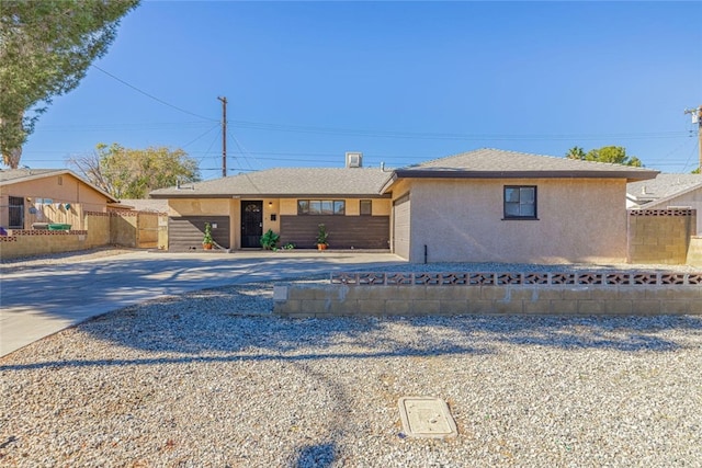 45409 Rodin Ave, Lancaster, CA 93535 - single story home with concrete driveway and stucco siding