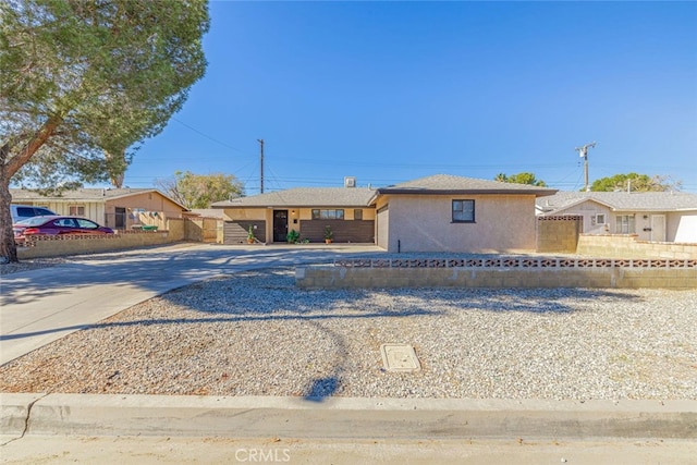 45409 Rodin Ave, Lancaster, CA 93535 - single story home featuring concrete driveway and stucco siding