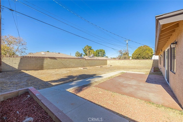 45409 Rodin Ave, Lancaster, CA 93535 - fenced backyard featuring a patio area