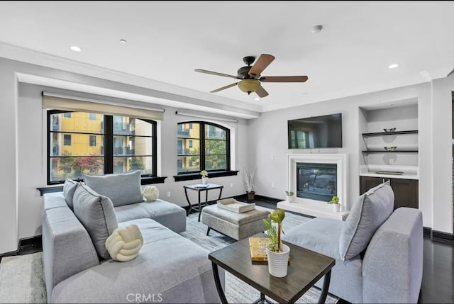 155 Cordova St Unit 203, Pasadena, CA 91105 - living room featuring ceiling fan, recessed lighting, wood finished floors, a glass covered fireplace, and built in features