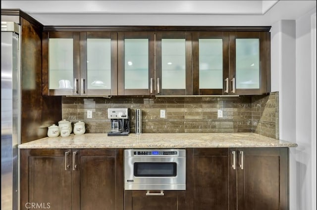 155 Cordova St Unit 203, Pasadena, CA 91105 - bar area featuring backsplash and oven